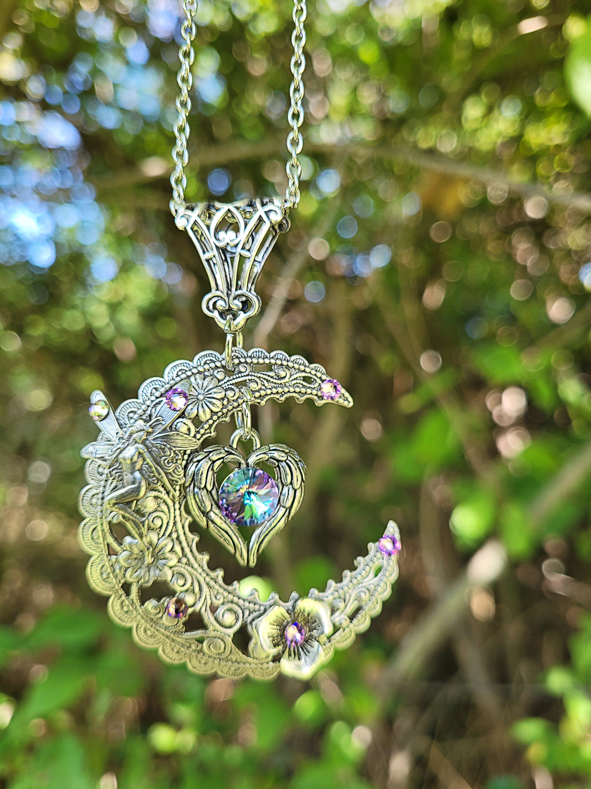 Magical  Sterling Silver Vintage Fairy on Crescent Moon necklace with  a heart and Swarovski crystals.  Fantasy jewelry lover gift.