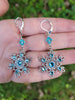 Sterling Silver Snowflake necklace and earring set made with aquamarine Swarovski crystals.