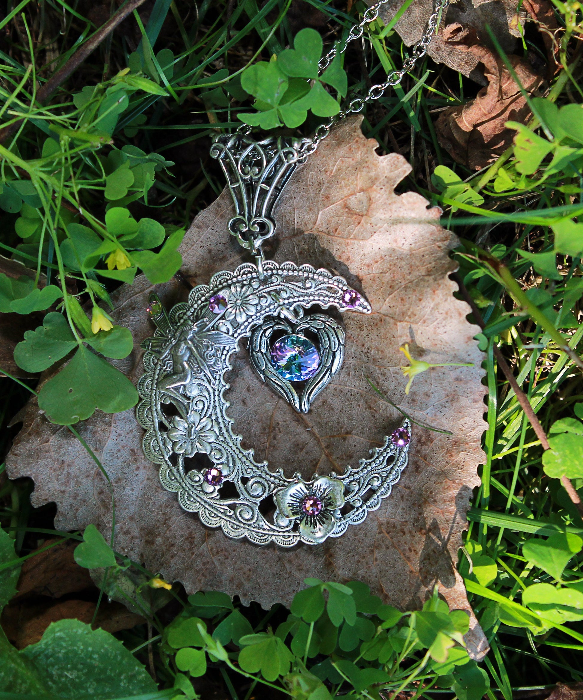 Magical  Sterling Silver Vintage Fairy on Crescent Moon necklace with  a heart and Swarovski crystals.  Fantasy jewelry lover gift.