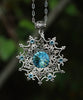 Sterling Silver Snowflake necklace and earring set made with aquamarine Swarovski crystals.
