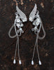 Elf fantasy ear cuffs with flowers and shoulder-length chains.  Elven jewelry.