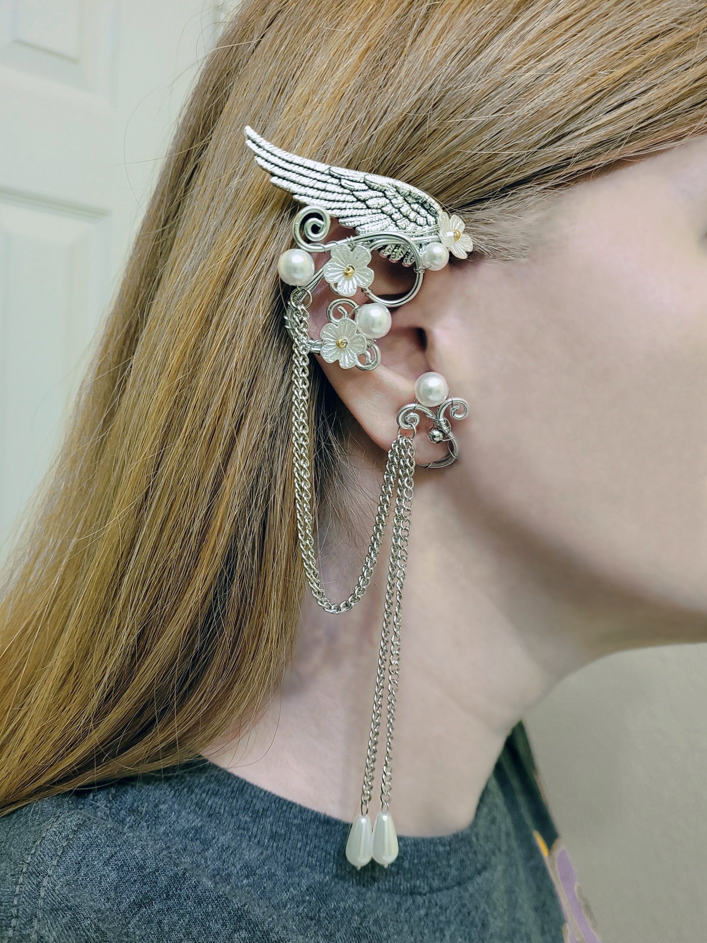 Elf fantasy ear cuffs with flowers and shoulder-length chains.  Elven jewelry.