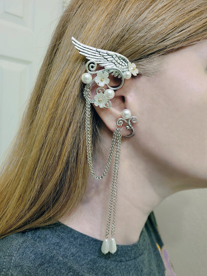 Elf fantasy ear cuffs with flowers and shoulder-length chains.  Elven jewelry.