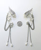Elf fantasy ear cuffs with flowers and shoulder-length chains.  Elven jewelry.