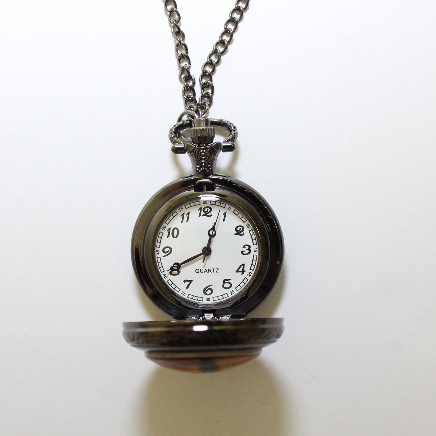 Dragon Eye Pocket Watch Necklace fully open to show clock face against a white background.