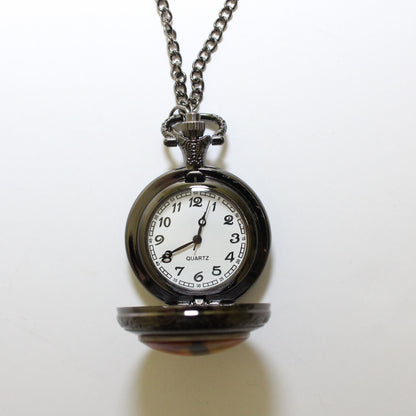 Dragon Eye Pocket Watch Necklace fully open to show clock face against a white background.