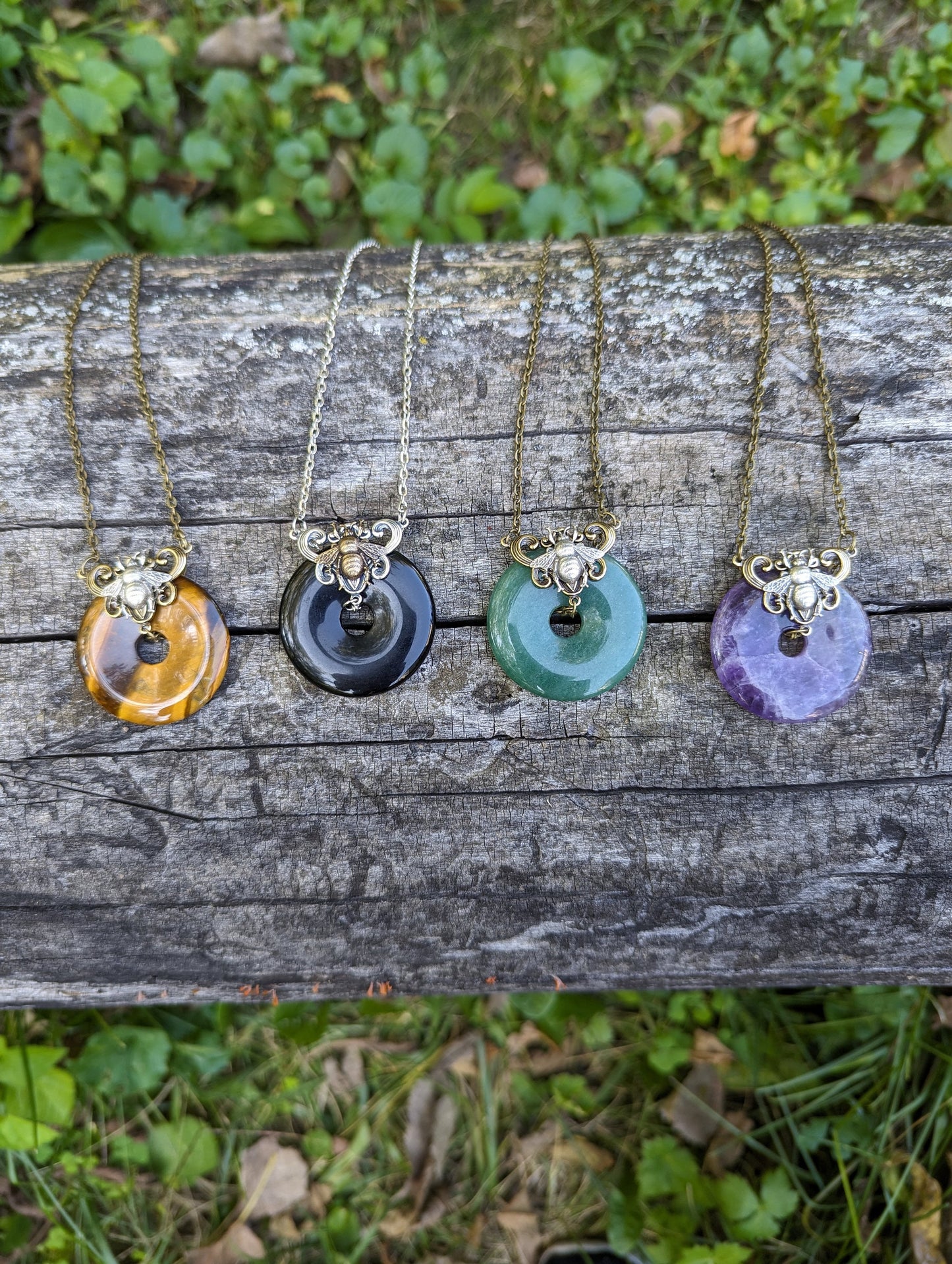 Black onyx donut stone necklace with bumble bee.  Bumblebee jewelry gift.