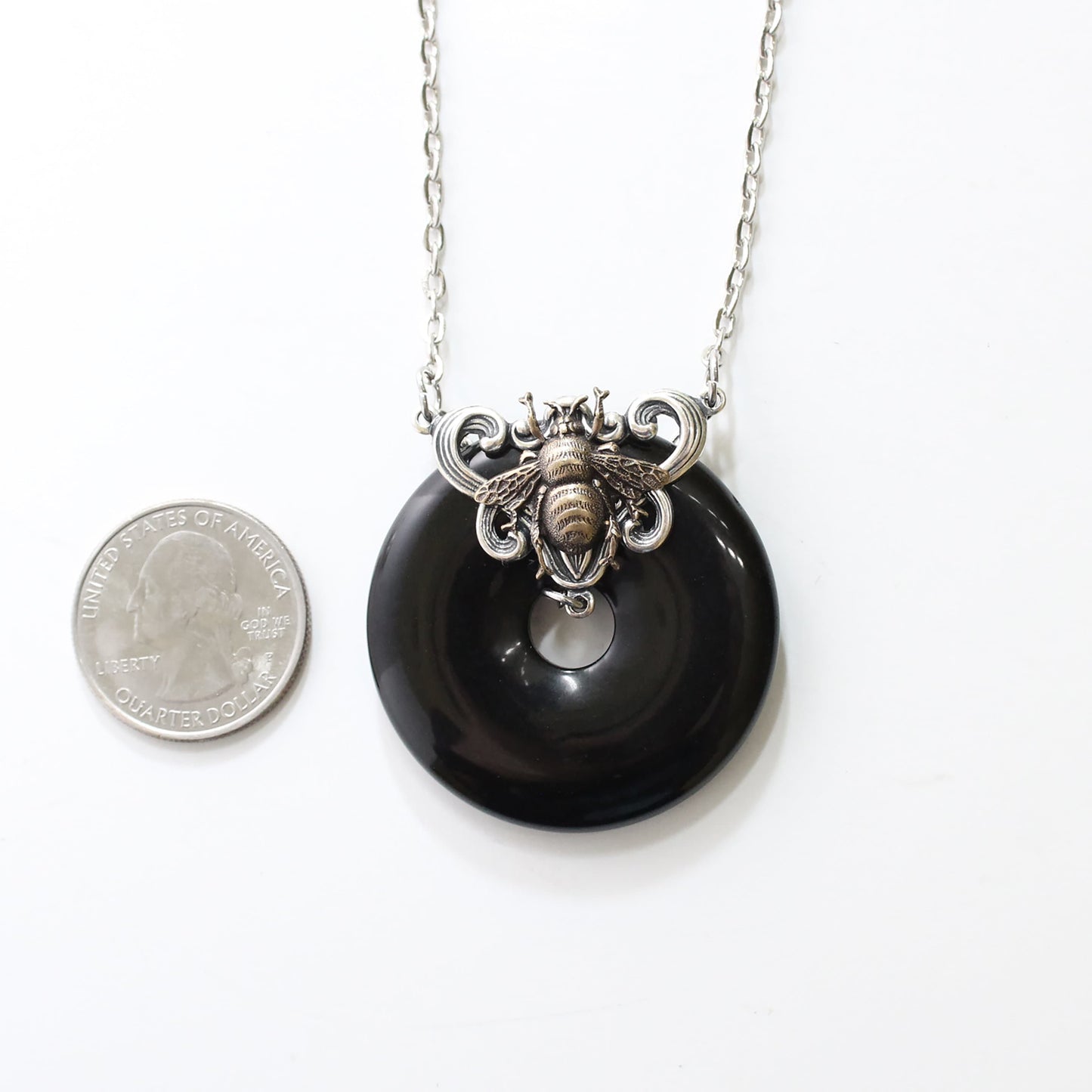 Black onyx donut stone necklace with bumble bee.  Bumblebee jewelry gift.