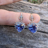 Sterling Silver Tanzanite Heart Earrings with Cubic Zirconia Stones.