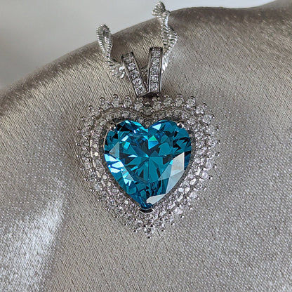 925 Sterling Silver Blue Topaz Cubic Zirconia Heart Pendant Necklace.