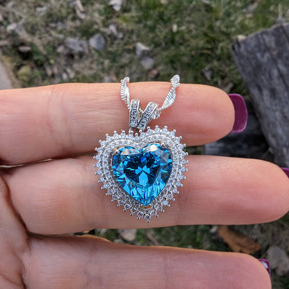 925 Sterling Silver Blue Topaz Cubic Zirconia Heart Pendant Necklace.